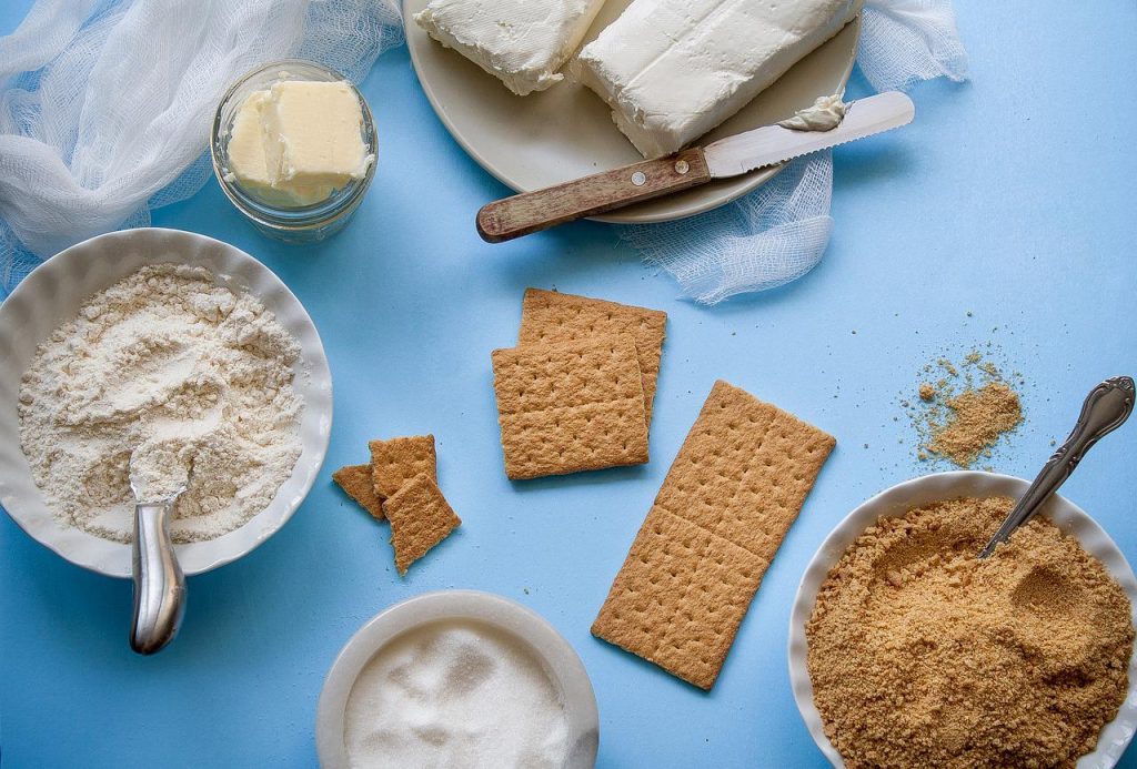 Cheesecake ingredients including graham crackers.