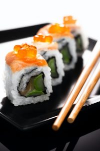 Sushi and chopsticks.