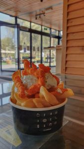 Cheetos in cup.